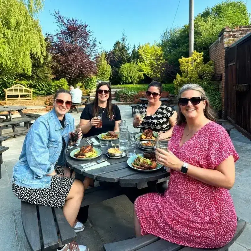 Guests in the garden at The Yew Tree, Maidstone