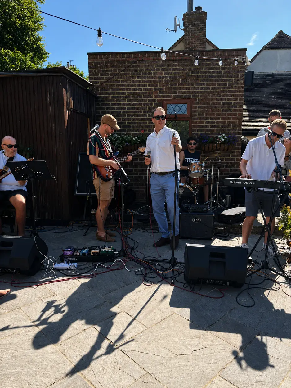 Live band performing in the garden at The Yew Tree, Maidstone